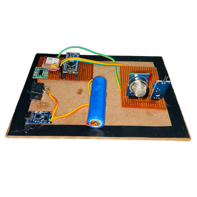 GSM-based Fire and LPG Leak Alert System – A circuit board with sensors and a GSM module for detecting fire and gas leaks, sending alerts via SMS